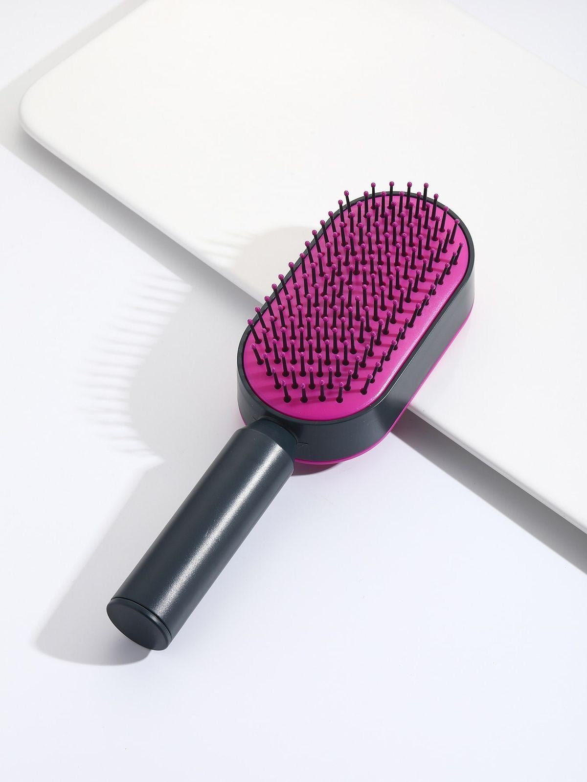 Effortless Hair Care: Self-Cleaning Brush